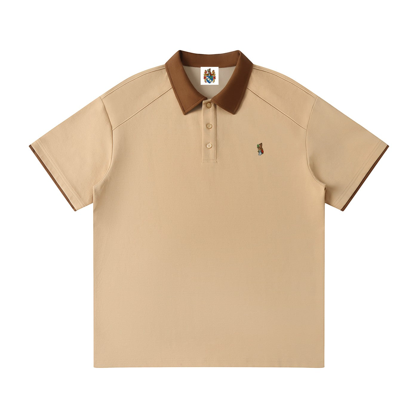 Norman Prince beige cotton blend short sleeve polo shirt with brown collar and sleeve trim, featuring a small embroidered bear graphic.