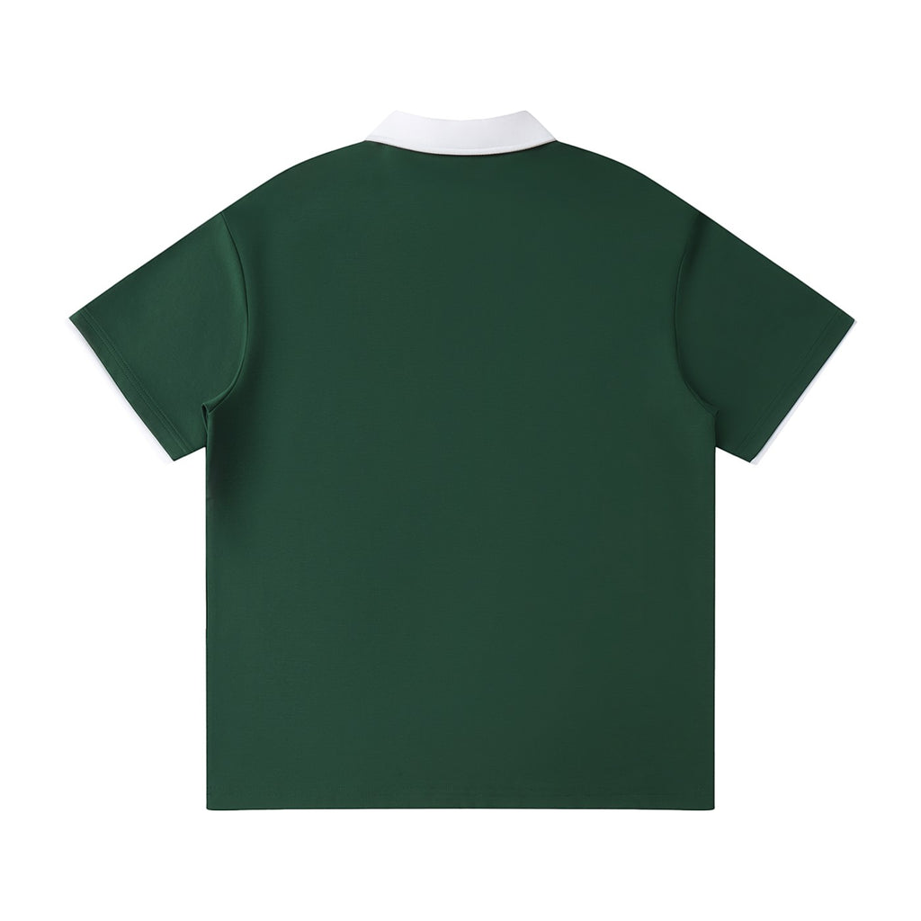 Norman Prince dark green cotton blend short sleeve polo shirt with white collar and sleeve trim.