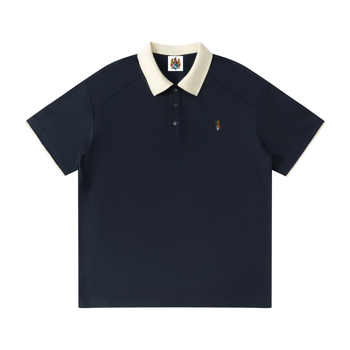 Norman Prince navy blue cotton blend short sleeve polo shirt with a contrasting cream collar and sleeve trim, featuring a small embroidered crest.